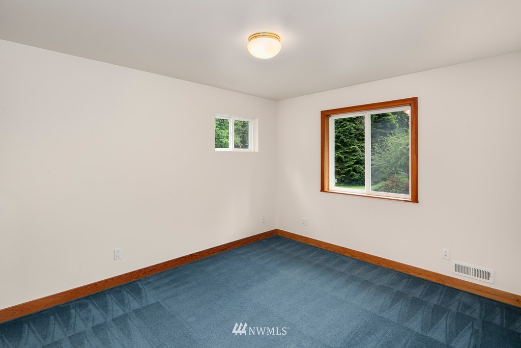 23402 Wallitner Road Arlington, WA 98223 - Photo 32 of 39 an empty room with a window