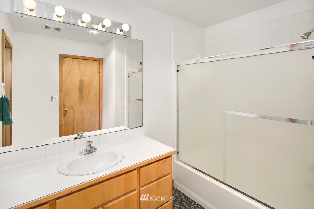 23402 Wallitner Road Arlington, WA 98223 - Photo 34 of 39 a bathroom with a sink and a mirror