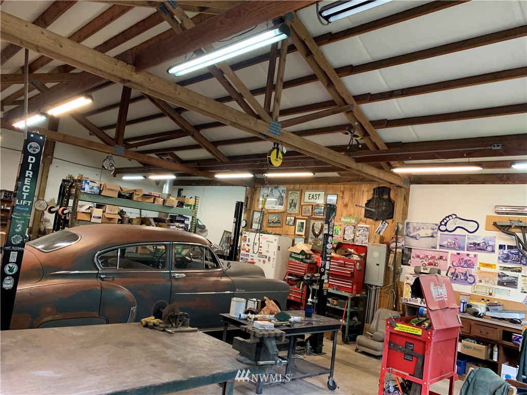 23402 Wallitner Road Arlington, WA 98223 - Photo 39 of 39 a view of parking garage with cars