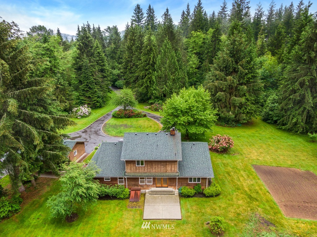 23402 Wallitner Road Arlington, WA 98223 - Photo 8 of 39 an aerial view of a house with garden space and street view