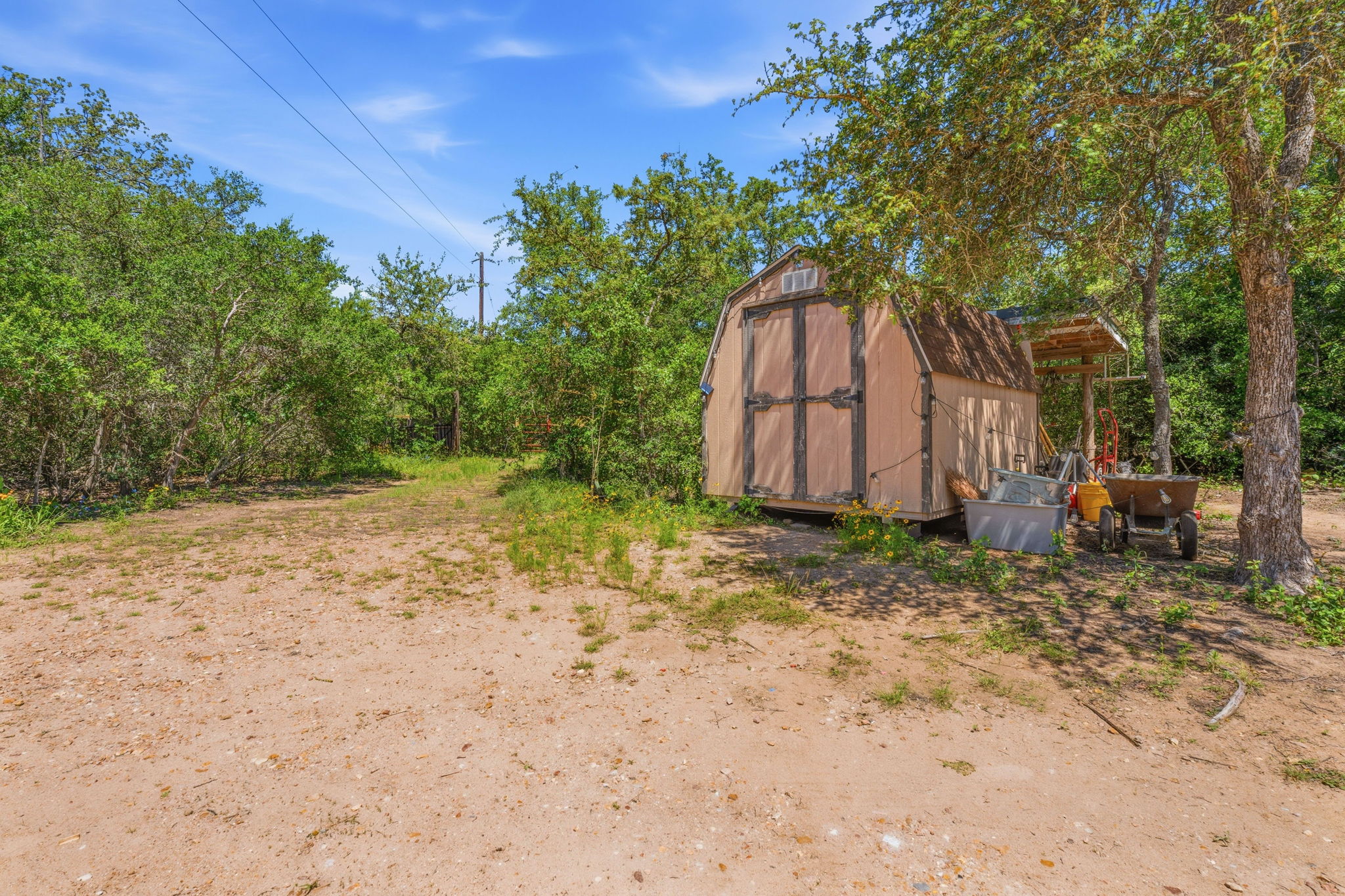 1998 Upper Elgin River Road Elgin, TX 78621 - Photo 20 of 28 a backyard of a house with lots of green space