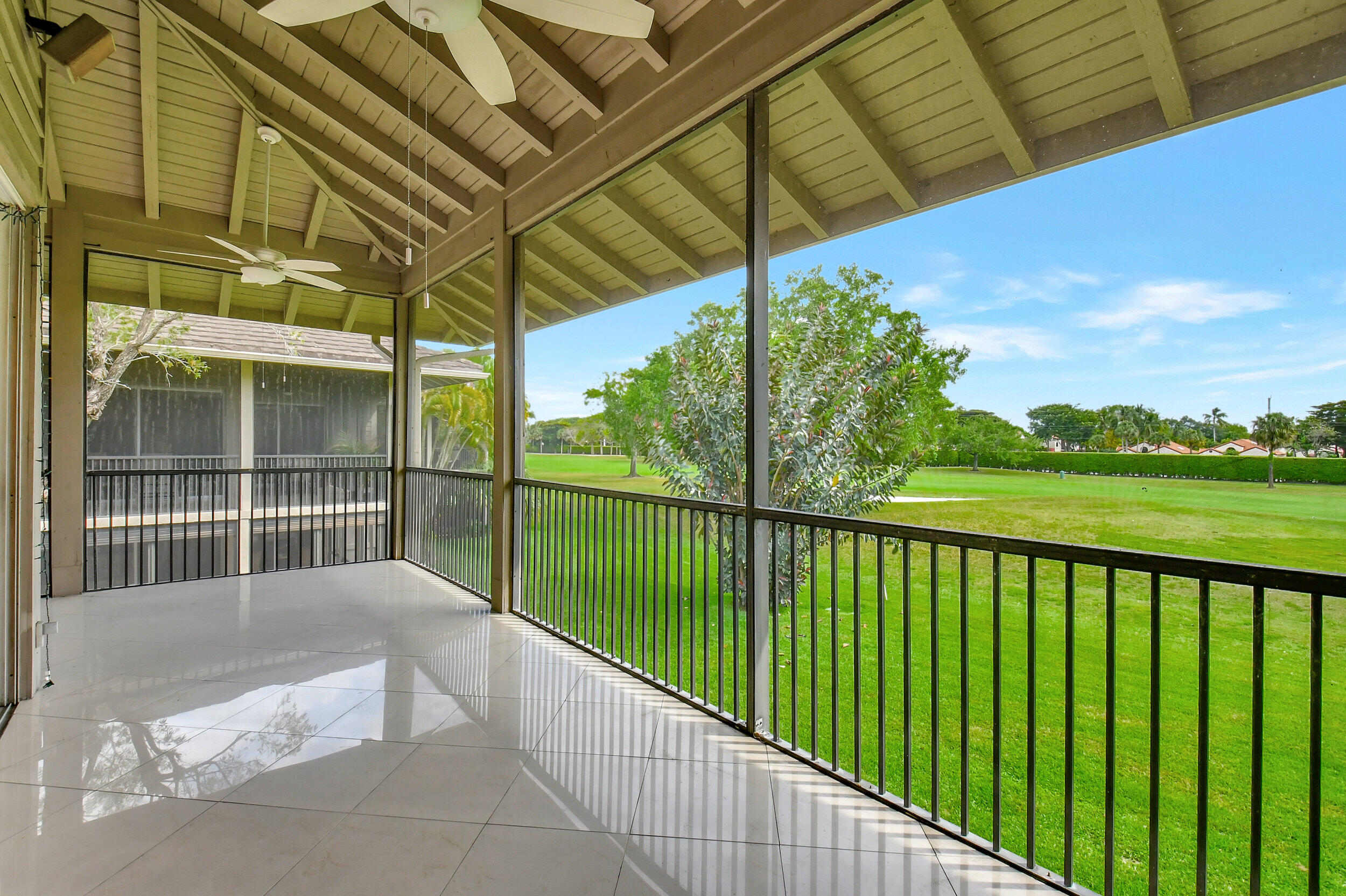 7628 Elm Ridge Drive, Unit 10U Boca Raton, FL 33433 - Photo 3 of 19 Wrap around screened balcony