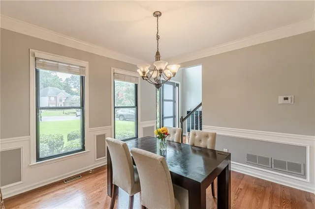 a bedroom that has a bed and a window in it