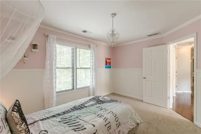 a bathroom with a bathtub and a window