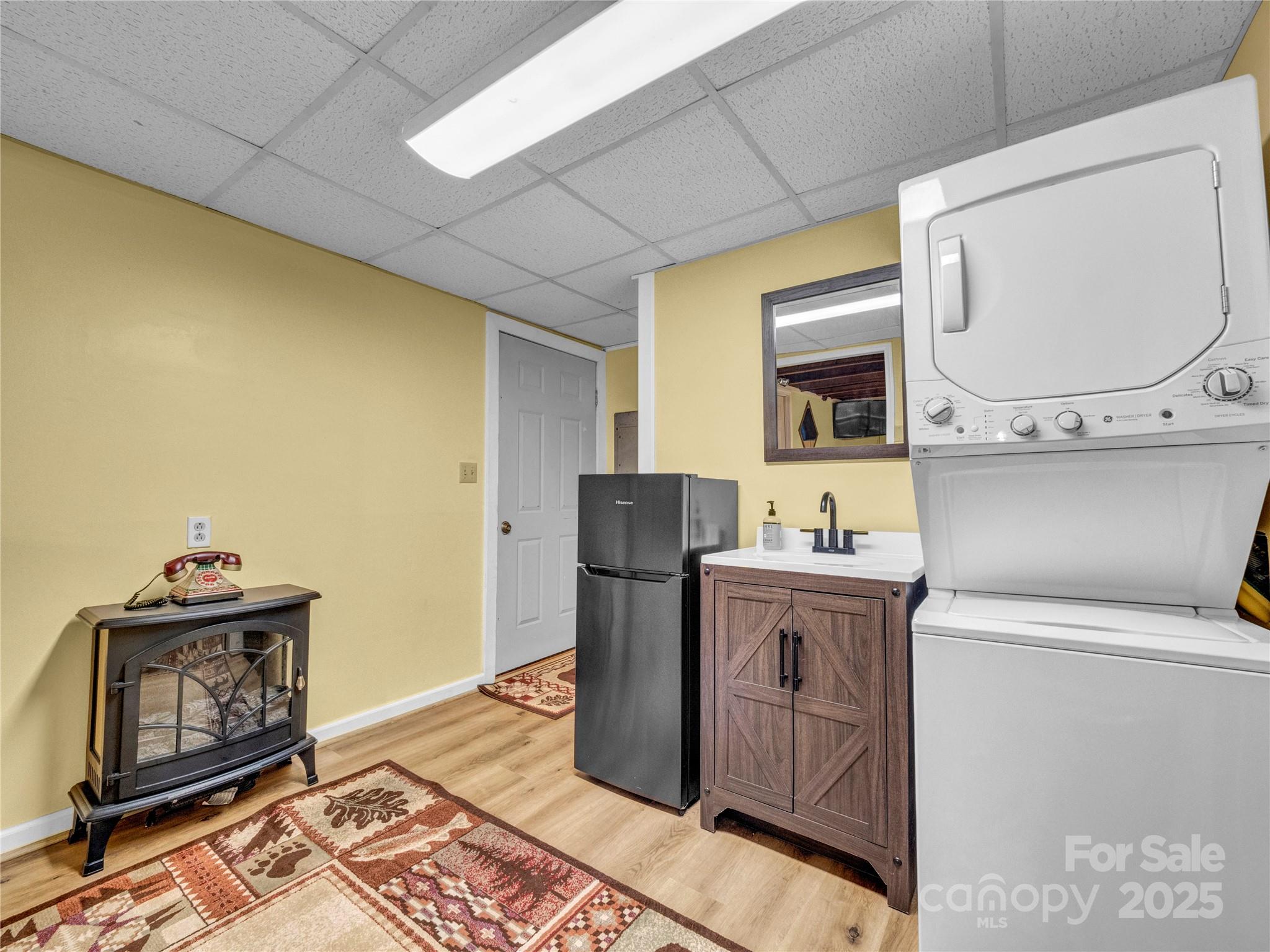 5349 Hickory Nut Gap Road Newland, NC 28657 - Photo 14 of 34 a kitchen with a stove a sink and a microwave