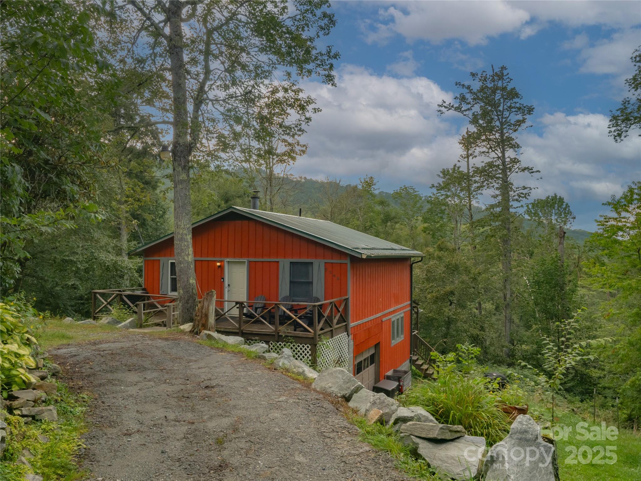 5349 Hickory Nut Gap Road Newland, NC 28657 - Photo 2 of 34 front view of a house with a yard
