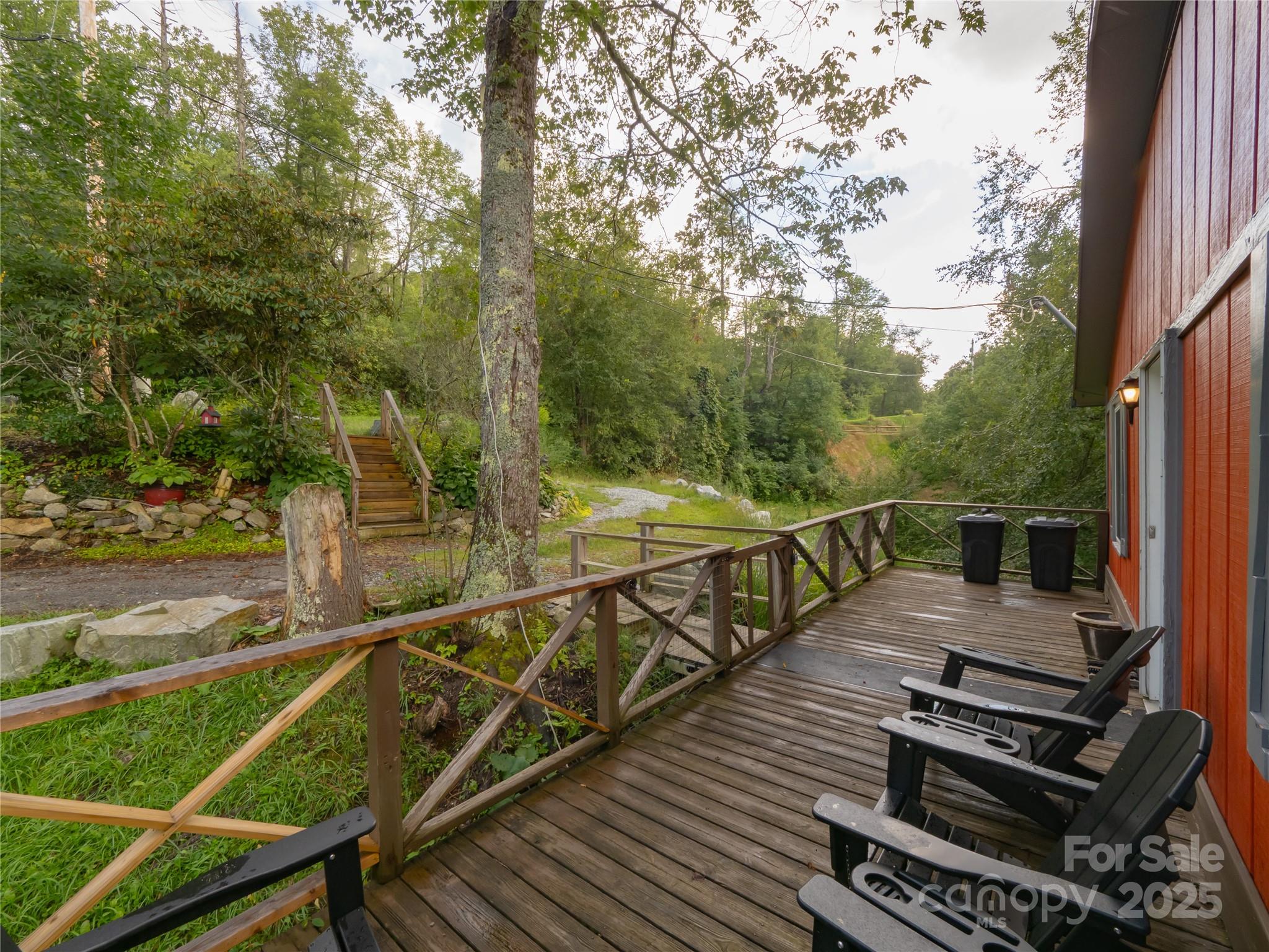 5349 Hickory Nut Gap Road Newland, NC 28657 - Photo 28 of 34 a view of a balcony with wooden floor