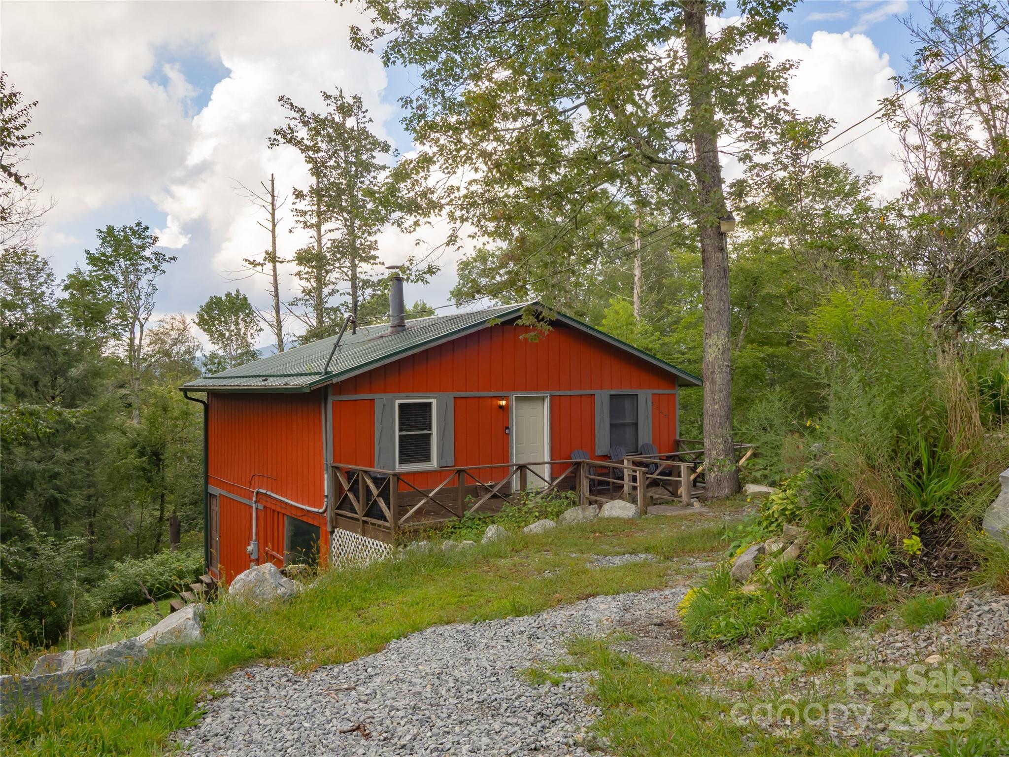 5349 Hickory Nut Gap Road Newland, NC 28657 - Photo 31 of 34 a front view of a house with garden