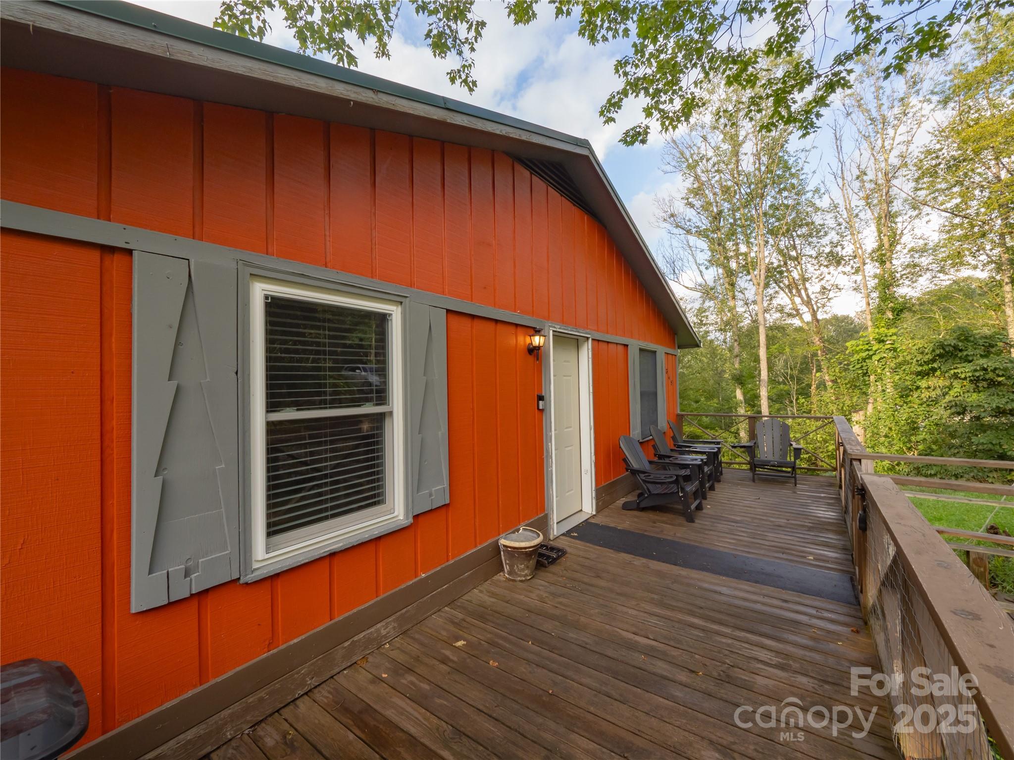 5349 Hickory Nut Gap Road Newland, NC 28657 - Photo 33 of 34 a backyard of a house with seating space