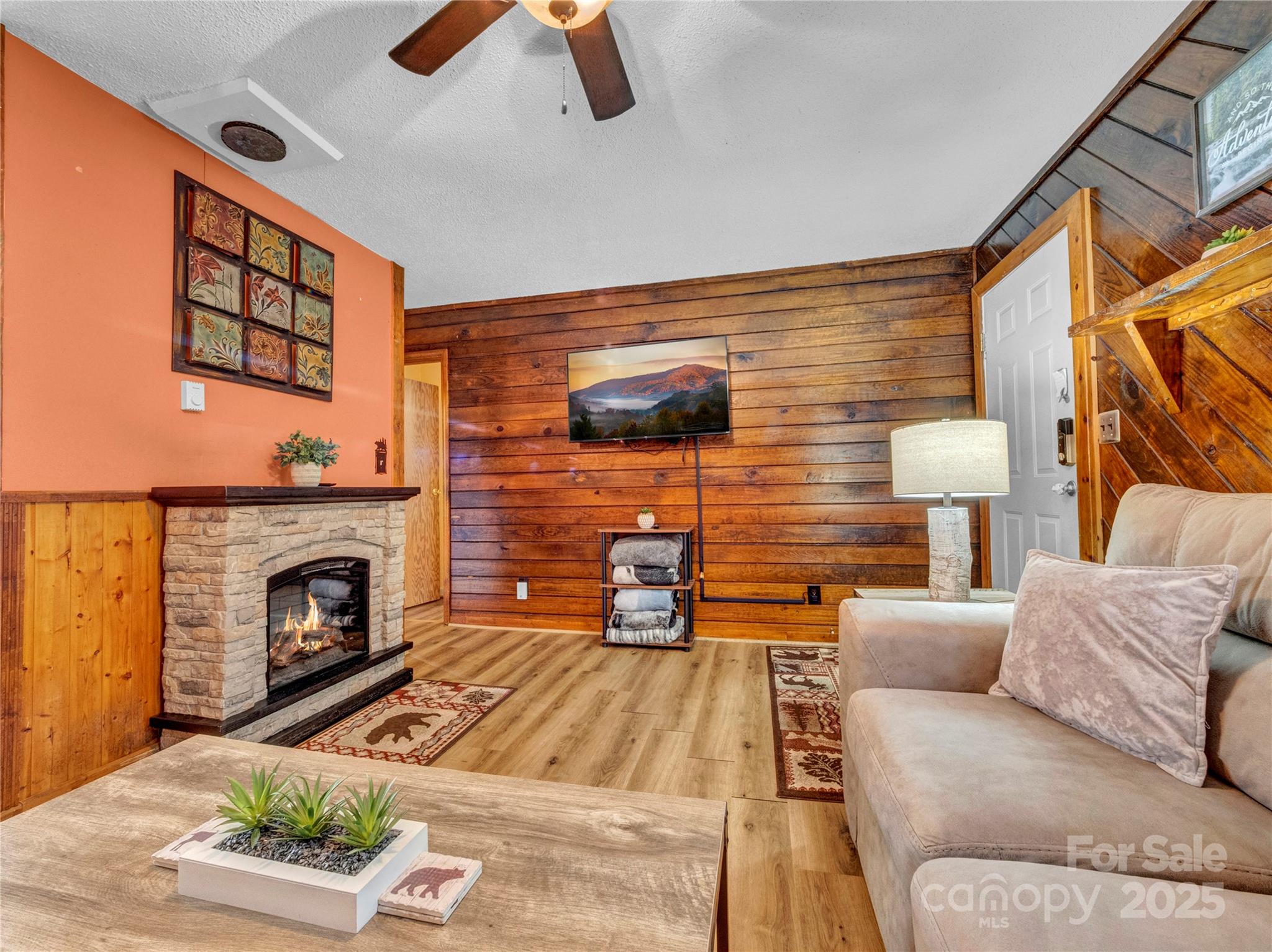 5349 Hickory Nut Gap Road Newland, NC 28657 - Photo 7 of 34 a living room with furniture and a fireplace