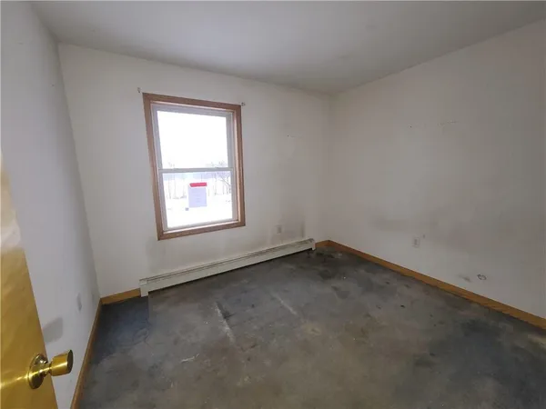 an empty room with a window