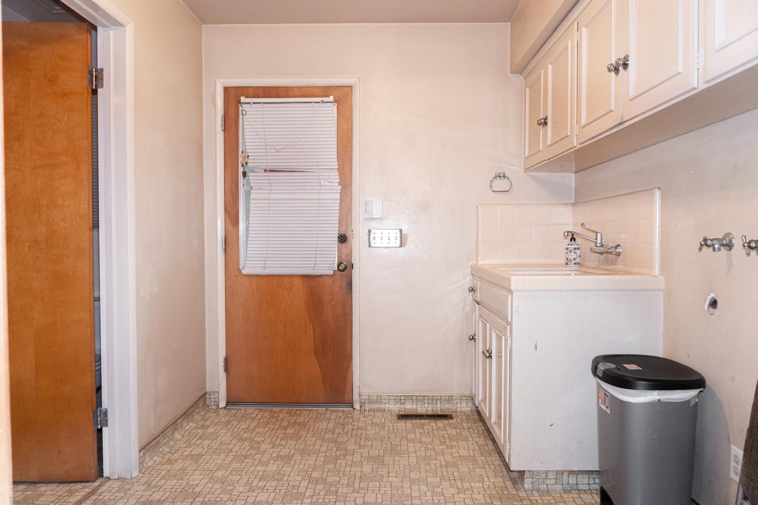5877 East Dwight Way Fresno, CA 93727 - Photo 21 of 31 a bathroom with a sink and a toilet