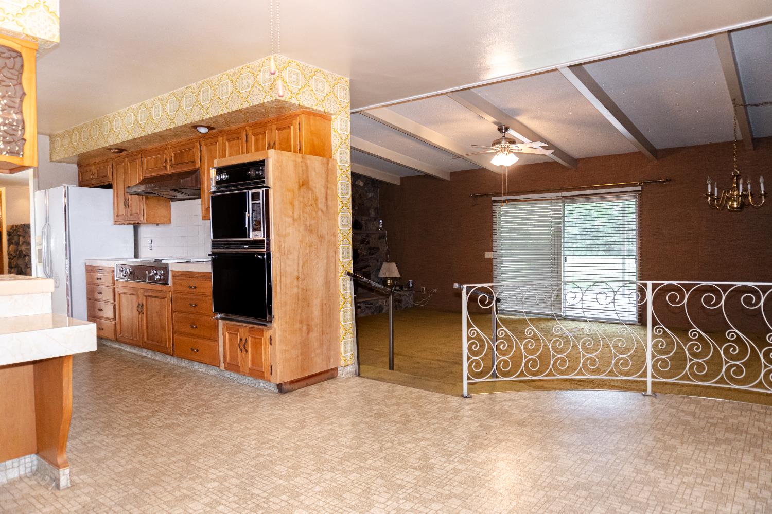 5877 East Dwight Way Fresno, CA 93727 - Photo 7 of 31 a view of kitchen with furniture and refrigerator