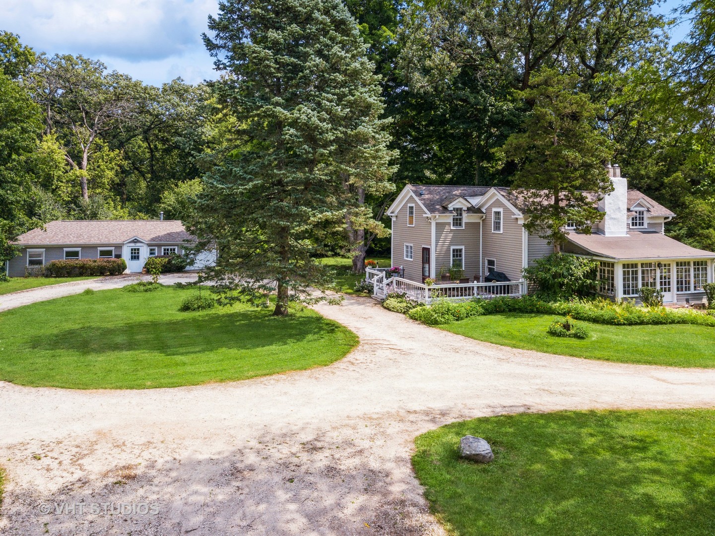 27282 West Cuba Road Barrington, IL 60010 - Photo 41 of 45 a front view of a house with a garden and trees