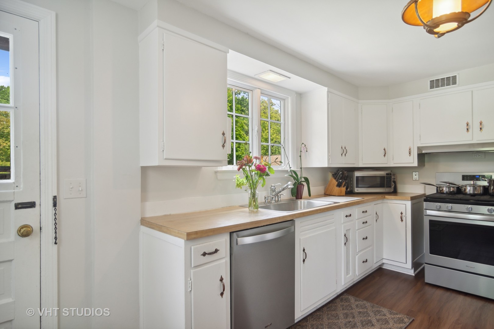 27282 West Cuba Road Barrington, IL 60010 - Photo 8 of 45 a kitchen with white cabinets and white appliances
