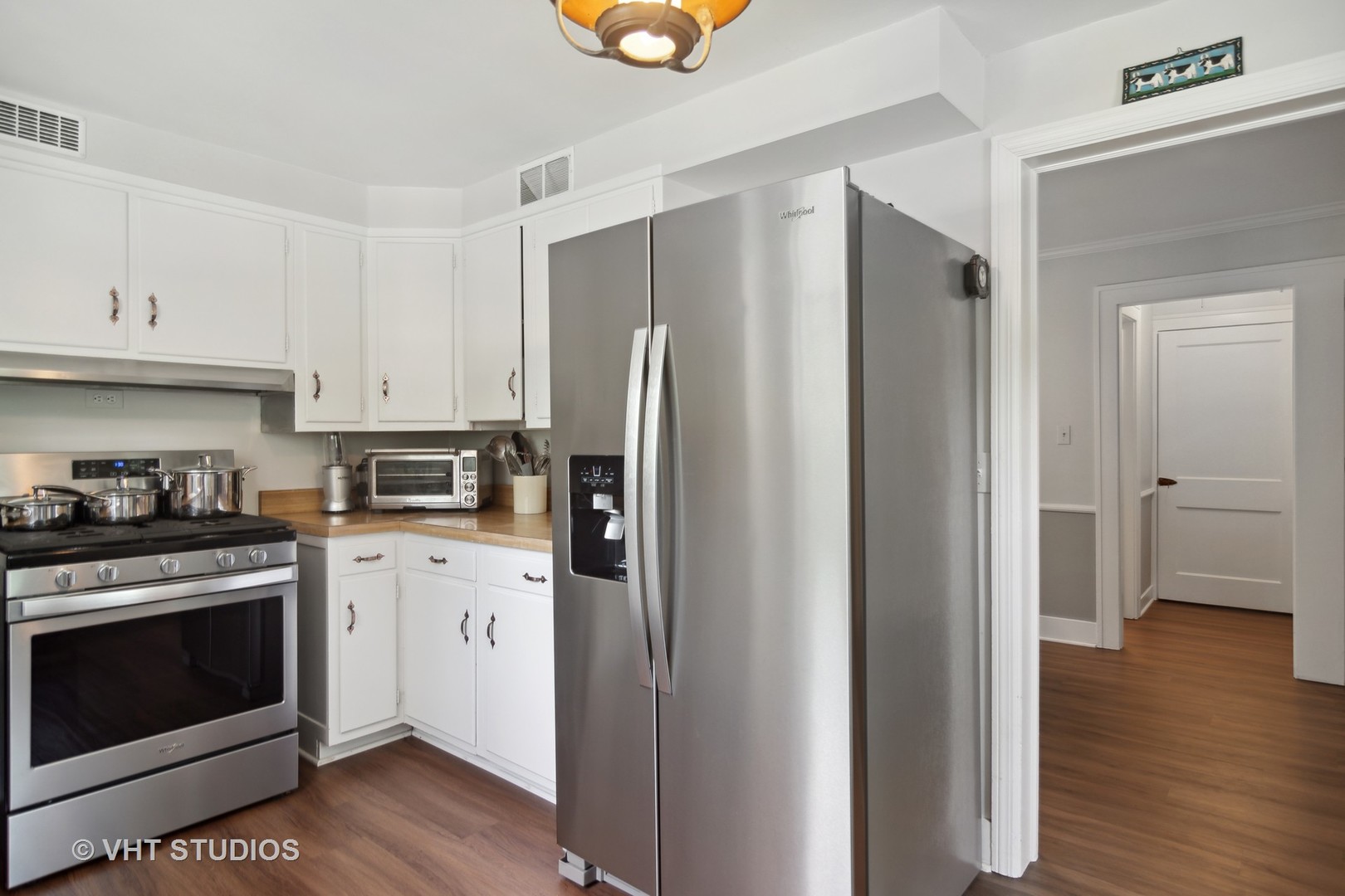 27282 West Cuba Road Barrington, IL 60010 - Photo 9 of 45 a kitchen with stainless steel appliances a stove a refrigerator and a sink