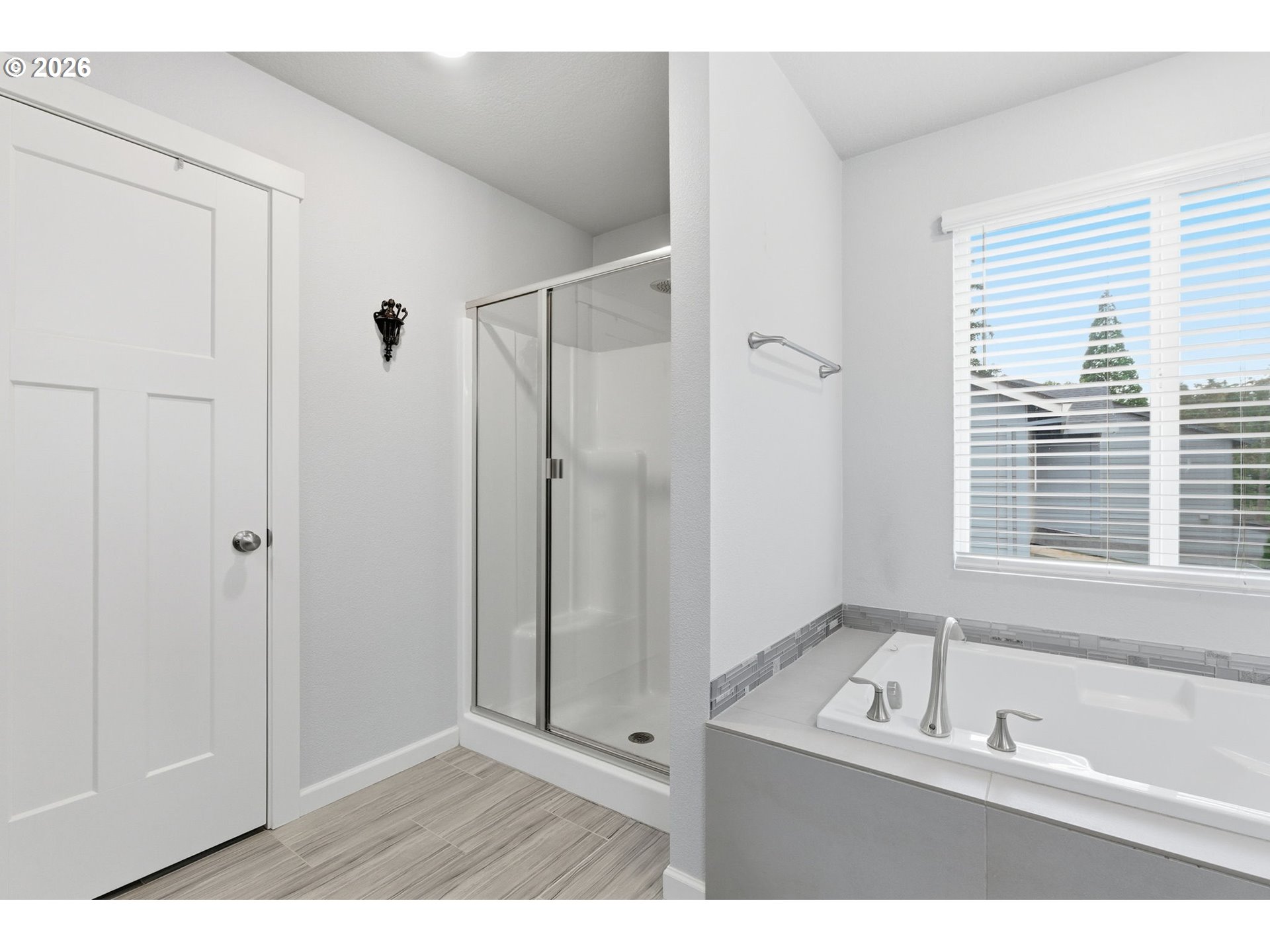 476 Southwest 15th Avenue Canby, OR 97013 - Photo 32 of 41 a bathroom with a tub shower and a sink