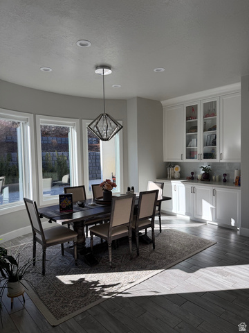 614 East High Lane Alpine, UT 84004 - Photo 39 of 75 Dining room featuring light wood-type flooring and hanging lights