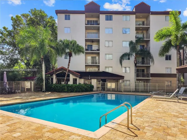 a view of a house with swimming pool