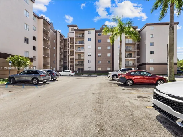 a view of street with parked cars