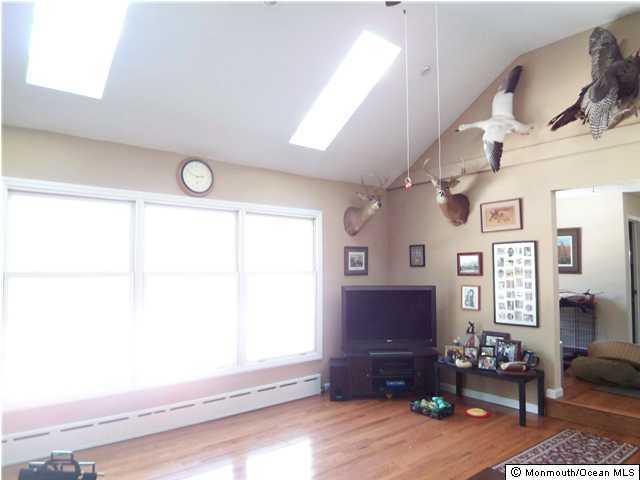 606 Freehold Road Jackson, NJ 08527 - Photo 2 of 3 a view of entryway with workspace and window