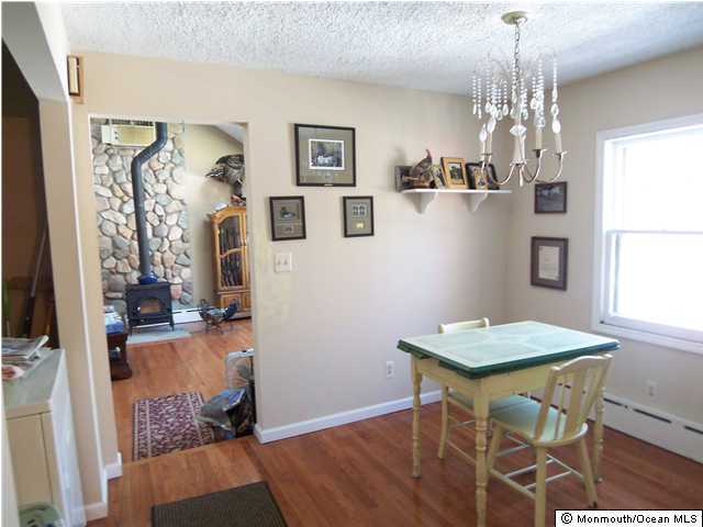 606 Freehold Road Jackson, NJ 08527 - Photo 3 of 3 a workspace with furniture and window