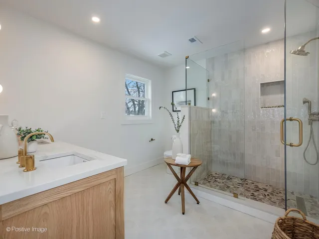 a utility room with sink dryer and washer