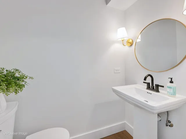 an empty room with wooden floor