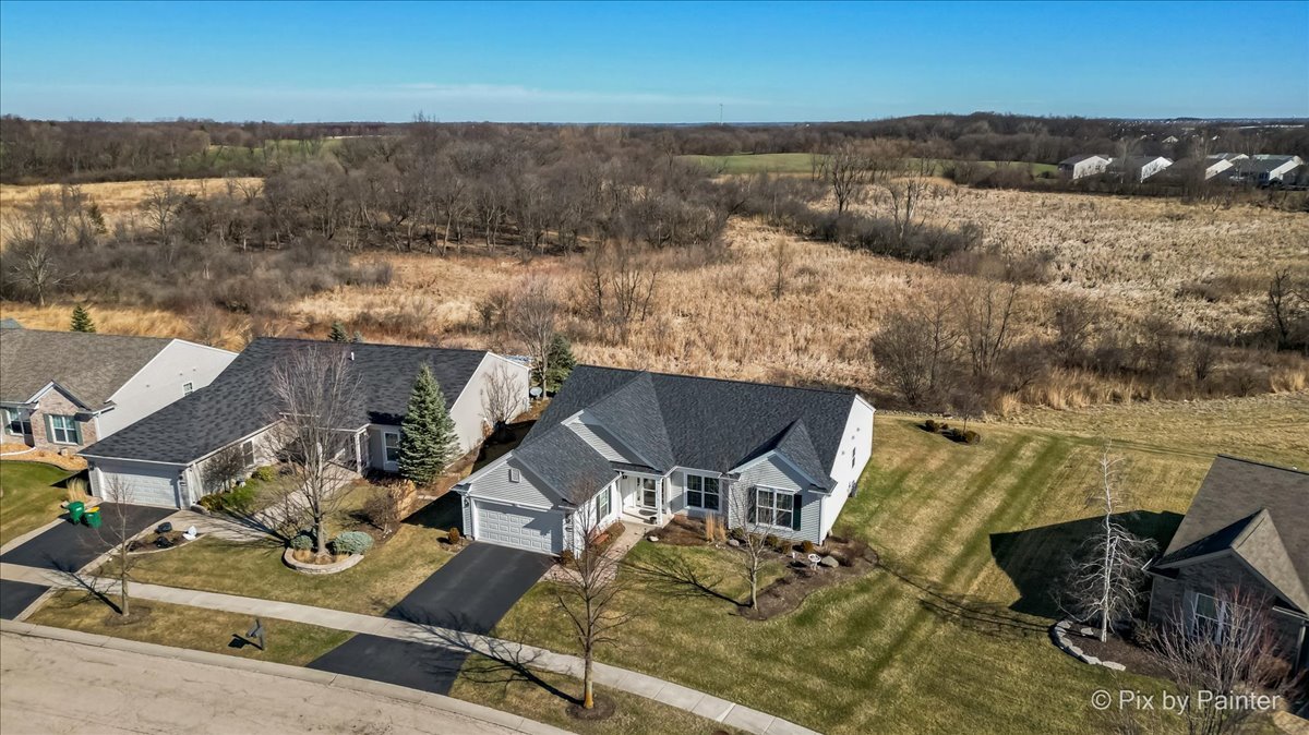 12290 Russet Lane Huntley, IL 60142 - Photo 34 of 38 an aerial view of a house with lake view