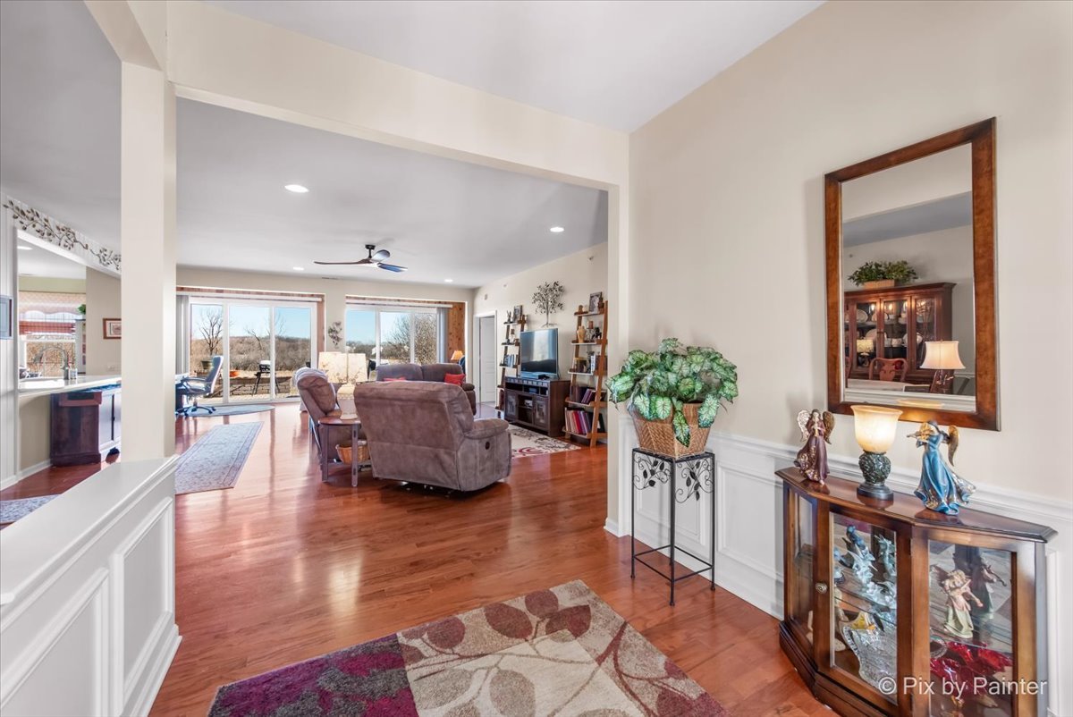 12290 Russet Lane Huntley, IL 60142 - Photo 4 of 38 a living room with furniture and a wooden floor