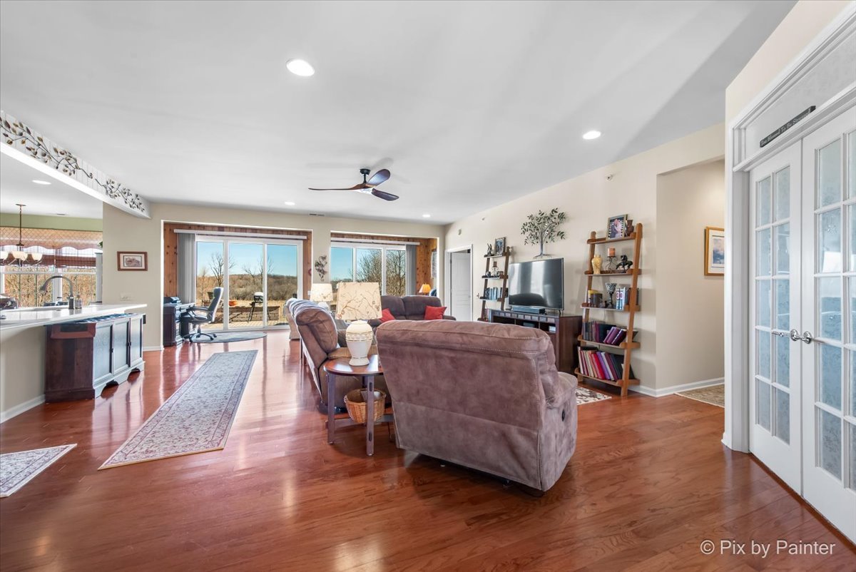 12290 Russet Lane Huntley, IL 60142 - Photo 5 of 38 a living room with furniture and a wooden floor