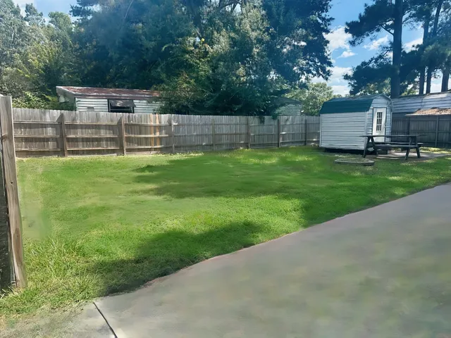 a view of a backyard with a garden