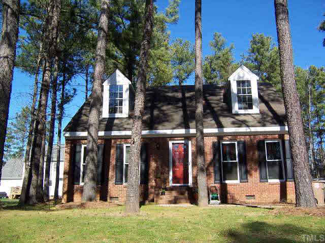 990 Templeridge Road Wake Forest, NC 27587 - Photo 1 of 7 front view of a house with a yard