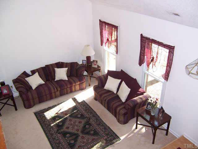 990 Templeridge Road Wake Forest, NC 27587 - Photo 2 of 7 a living room with furniture and a couch