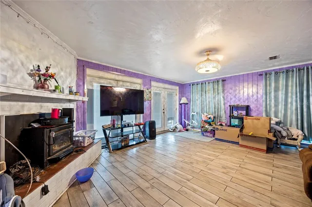 a work room with furniture and a chandelier