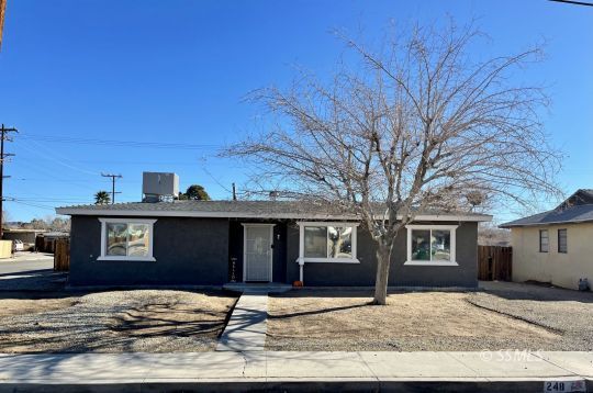 248 North Warner Street Ridgecrest, CA 93555 - Photo 1 of 21 a view of a house with a patio