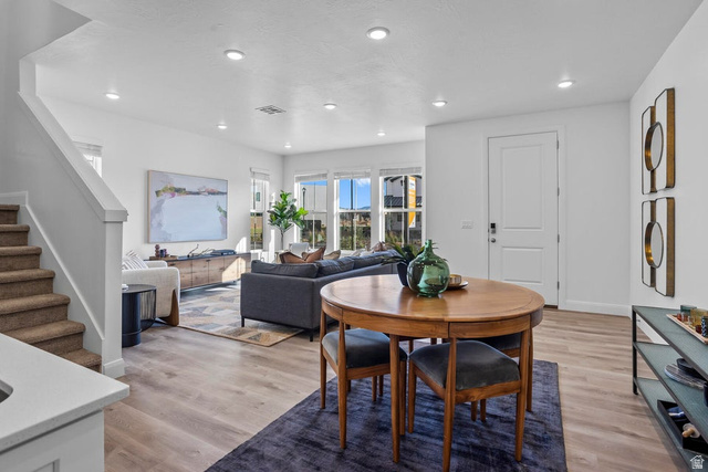 488 West Greenstone Pl Street, Unit 1010 St. George, UT 84790 - Photo 18 of 34 Open-concept living space featuring wood-finish flooring, recessed lighting, and a neutral color palette