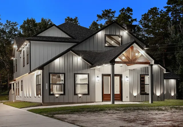 a view of a city with lush green forest