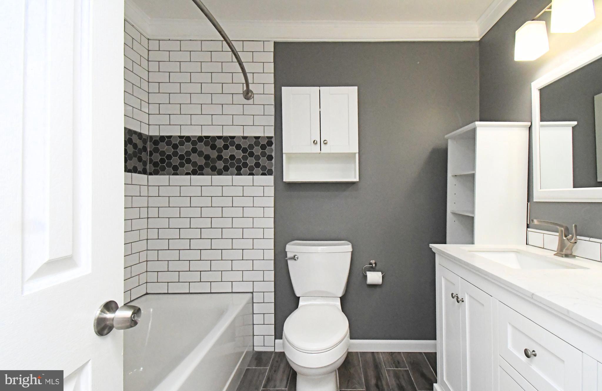 22 Fitzwatertown Road, Unit A10 Willow Grove, PA 19090 - Photo 21 of 30 Stylish bath tiles and double vanity