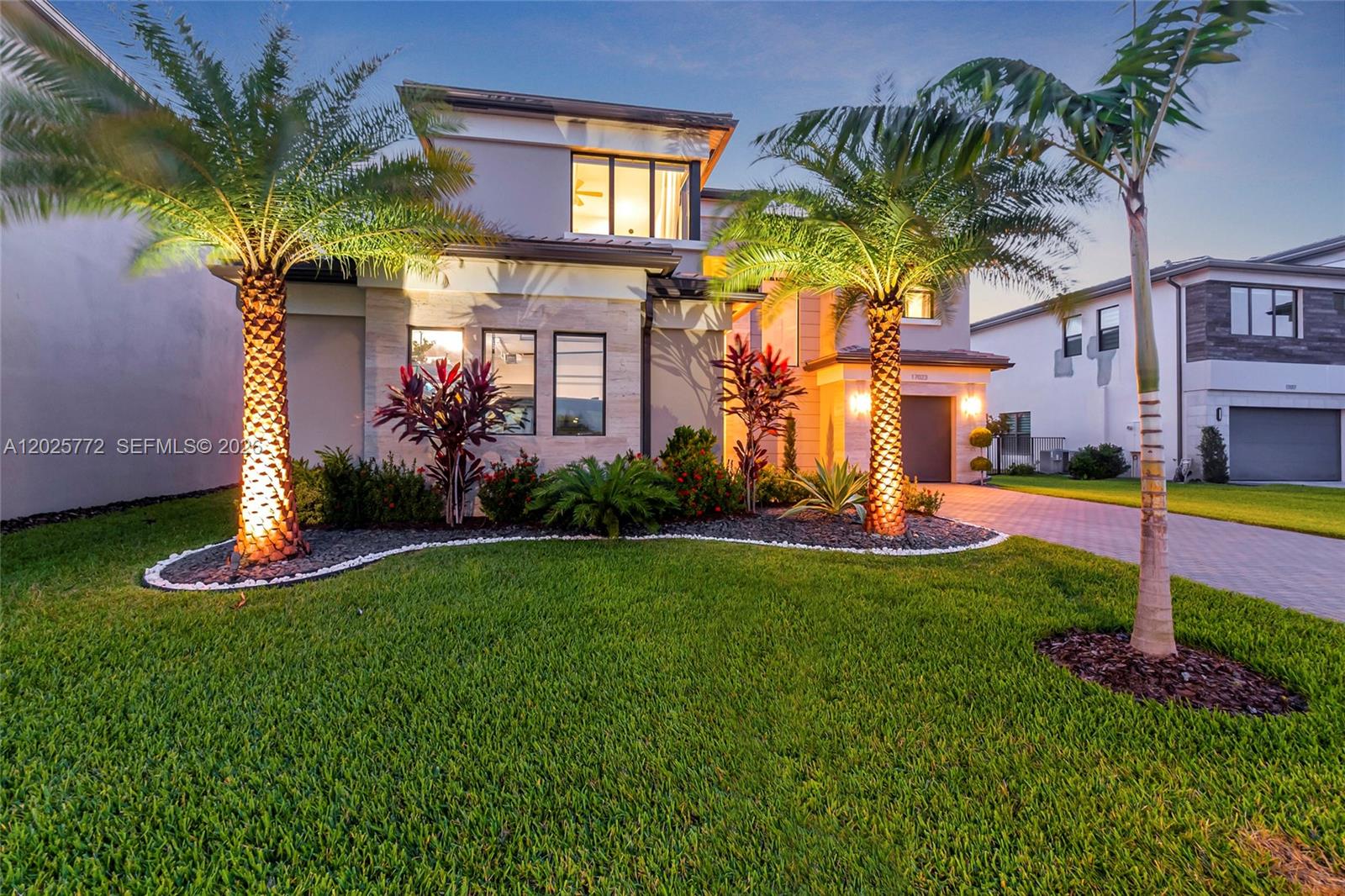 17023 Wandering Wave Avenue Boca Raton, FL 33496 - Photo 64 of 84 a view of a house with swimming pool and a yard