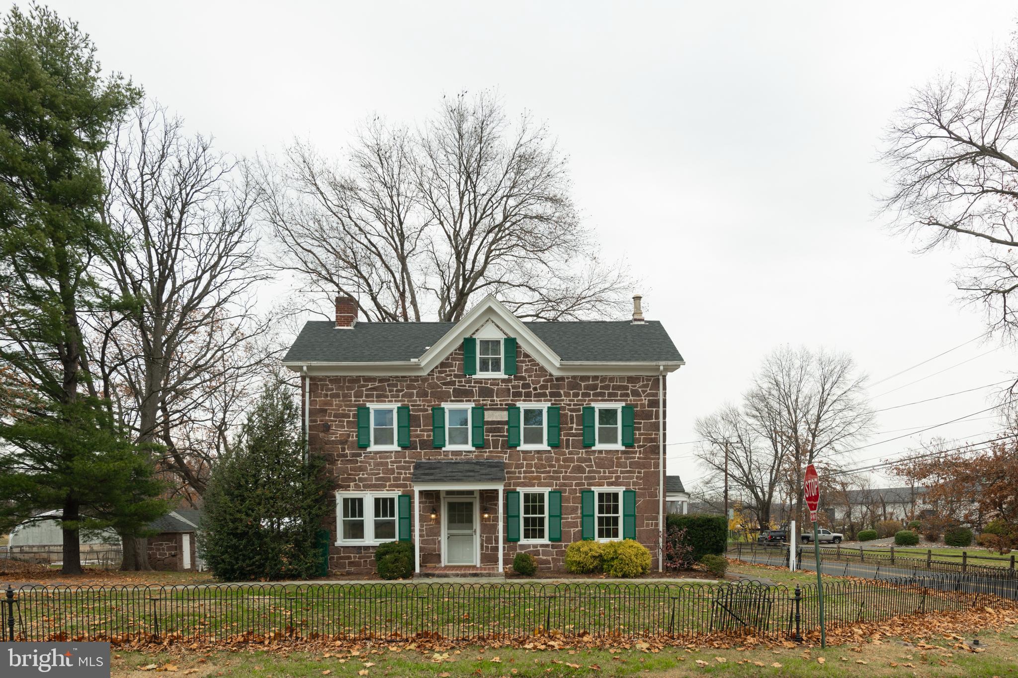 804 Sanatoga Road Pottstown, PA 19465 - Photo 6 of 28 a front view of a house with a garden