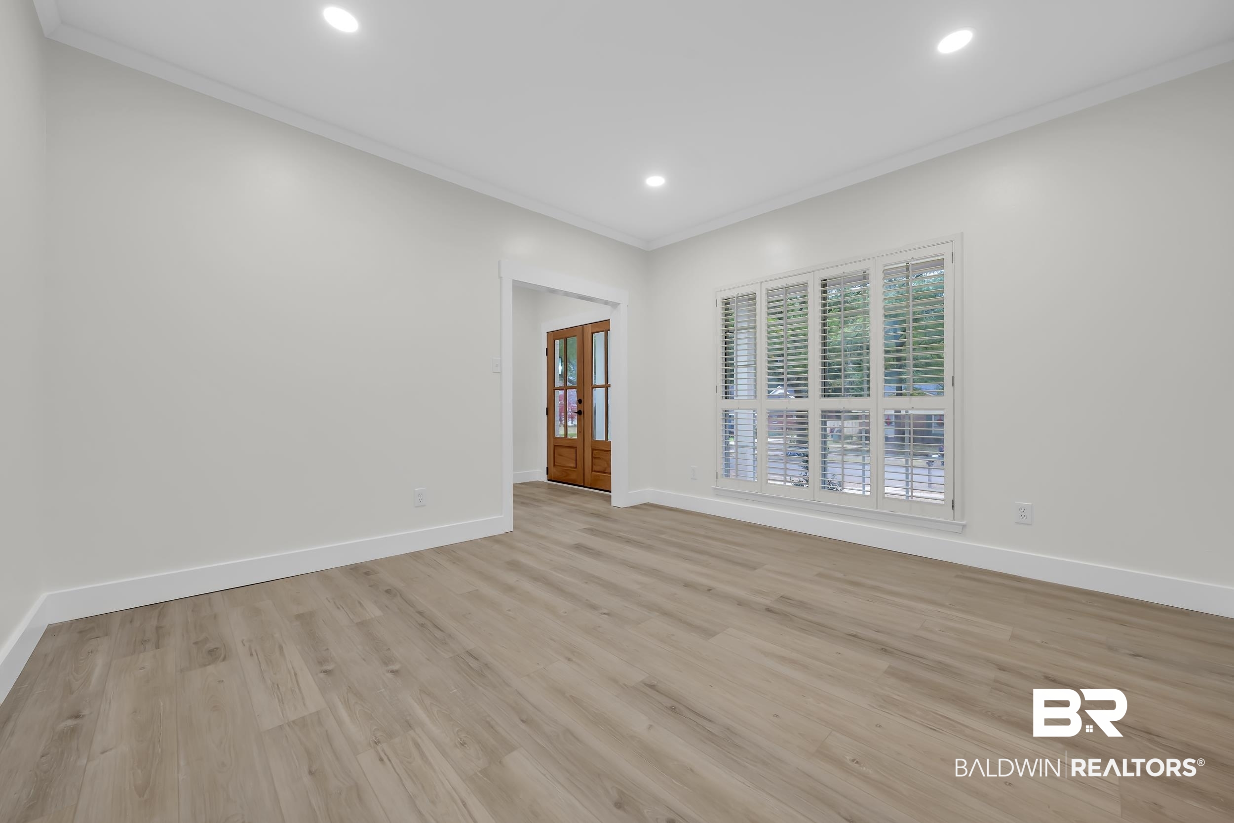 4924 Brooke Court Mobile, AL 36618 - Photo 6 of 34 Empty room featuring light wood-type flooring, ornamental molding, and recessed lighting