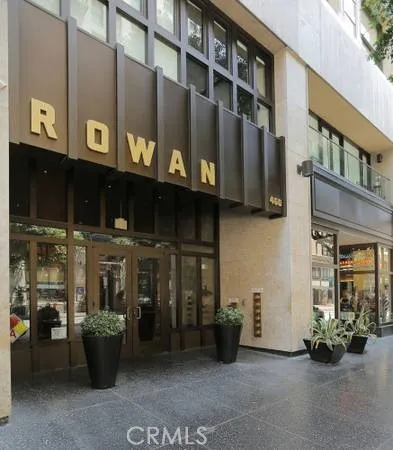 a view of a building with sitting area