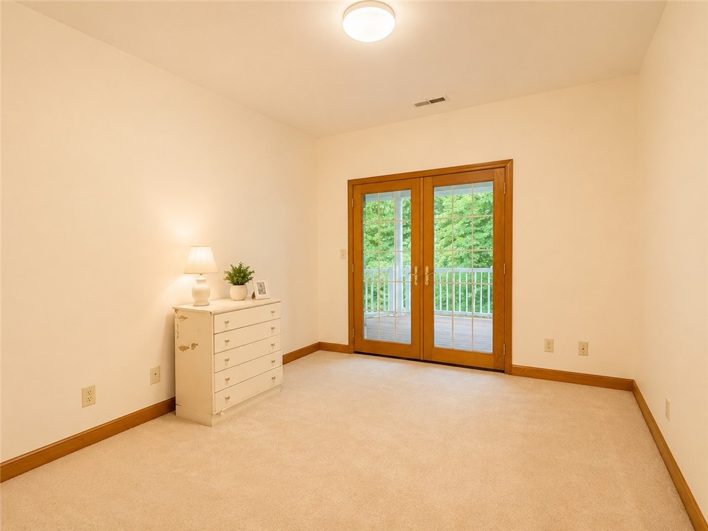 59 Kickapoo Valley Drive Charleston, IL 61920 - Photo 29 of 46 a view of an empty room with a window