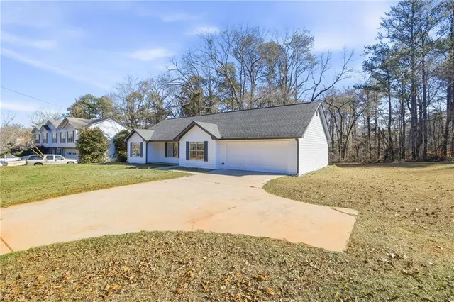 a house with trees in front of it