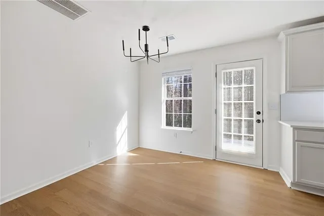 an empty room with windows