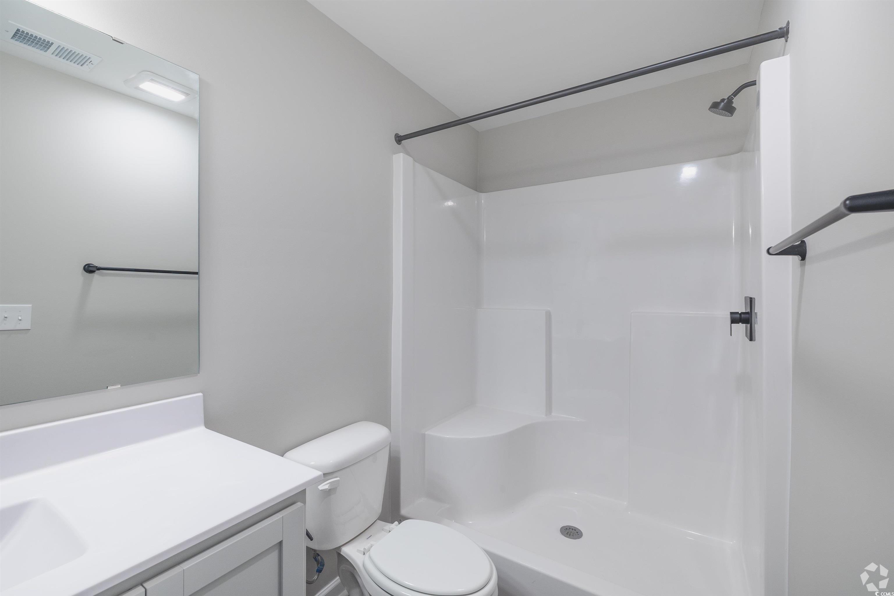 318 South Black Swamp Court, Unit 202 Conway, SC 29526 - Photo 4 of 8 Bathroom with vanity and a shower