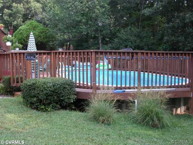 6020 Barrister Road Chesterfield, VA 23832 - Photo 2 of 12 a view of a backyard with a swing