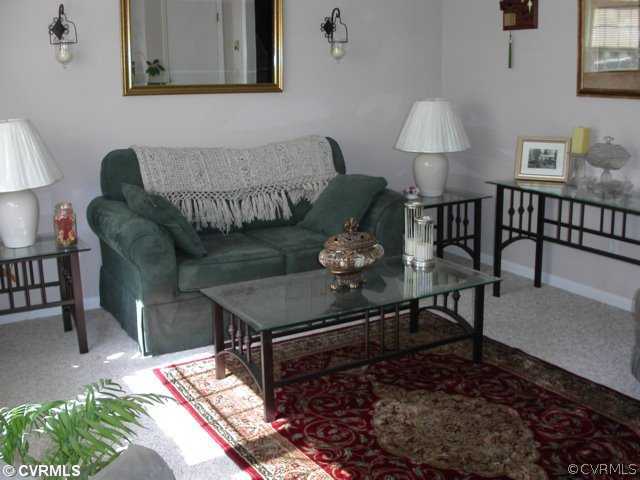 6020 Barrister Road Chesterfield, VA 23832 - Photo 6 of 12 a living room with furniture and a rug