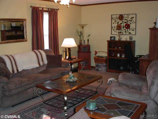 6020 Barrister Road Chesterfield, VA 23832 - Photo 9 of 12 a living room with furniture and wooden floor